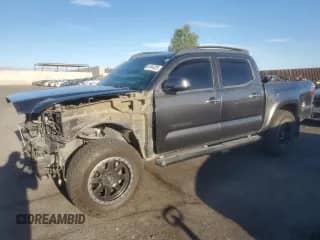 2016 Toyota Tacoma Limited с VIN 3TMGZ5AN2GM025243, выставлен на аукционе Copart как лот 80144325 с пробегом 94 718 миль миль и Списание • Salvage title. История ставок и продаж доступна на DreamBid. Изображение 1.