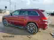 2017 Jeep Grand Cherokee Overland with VIN 1C4RJECG1HC868335, listed as a Copart auction lot 62851335 with 125,082 mi miles and Salvage title. Bid and sale history available at DreamBid. Image 2.