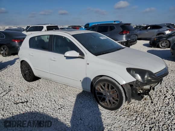 2008 Saturn Astra XR with VIN W08AT671985115975, listed as a Copart auction lot 77409614 with 112,702 mi miles and Salvage title. Bid and sale history available at DreamBid. Image 4.