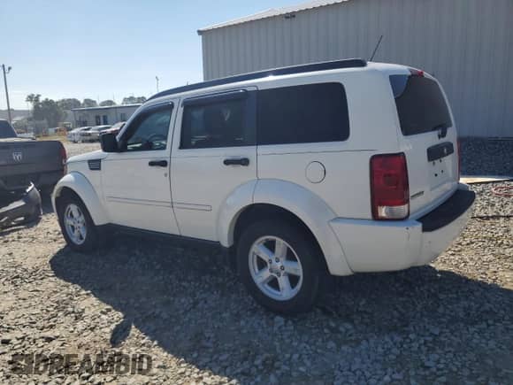 2007 Dodge Nitro SXT with VIN 1D8GT28K17W727700, listed as a Copart auction lot 83789135 with 150,618 mi miles and Salvage title. Bid and sale history available at DreamBid. Image 2.