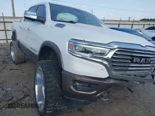 2020 Ram 1500 Longhorn with VIN 1C6SRFKT0LN127449, listed as a IAAI auction lot 42246252 with 52,034 mi miles and . Bid and sale history available at DreamBid. Image 1.