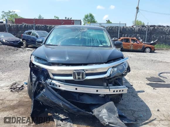 2021 Honda Pilot EX-L with VIN 5FNYF6H57MB044251, listed as a IAAI auction lot 42821959 with 53,645 mi miles and . Bid and sale history available at DreamBid. Image 13.