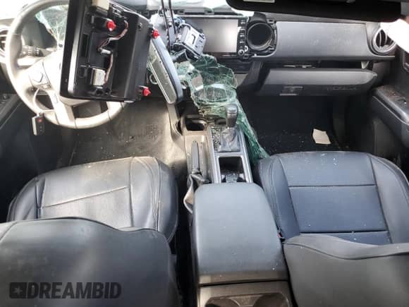 2023 Toyota Tacoma SR5 with VIN 3TYDZ5BN7PT020108, listed as a Copart auction lot 81069145 with 27,371 mi miles and Salvage title. Bid and sale history available at DreamBid. Image 8.