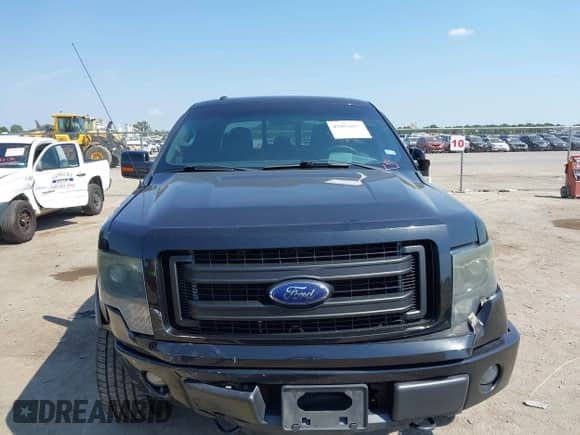 2014 Ford F-150 XLT with VIN 1FTFW1E64EFD14542, listed as a IAAI auction lot 43034880 with 197,620 mi miles and . Bid and sale history available at DreamBid. Image 12.