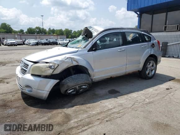 2011 Dodge Caliber Rush with VIN 1B3CB8HB6BD246849, listed as a Copart auction lot 68766535 with Not provided miles and Salvage title. Bid and sale history available at DreamBid. Image 1.