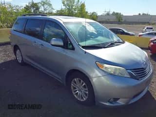 2012 Toyota Sienna XLE with VIN 5TDYK3DCXCS235154, listed as a IAAI auction lot 43366877 with 216,434 mi miles and . Bid and sale history available at DreamBid. Image 1.