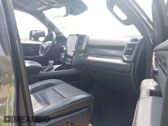 2021 Ram 1500 TRX with VIN 1C6SRFU99MN830292, listed as a IAAI auction lot 42449971 with 48,931 mi miles and . Bid and sale history available at DreamBid. Image 5.