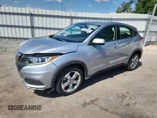 2019 Honda HR-V LX z VIN 3CZRU5H36KG710438, wystawiony jako Copart lot #83856345 z przebiegiem 56 227 mil mil oraz Szkoda całkowita • Salvage title. Historia ofert i sprzedaży dostępna na DreamBid. Obrazek 1.