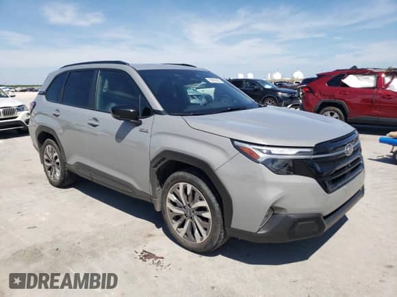 2025 Subaru Forester Touring Hybrid with VIN JF2SLSTD9SH412126, listed as a Copart auction lot 62663085 with 700 mi miles and Salvage title. Bid and sale history available at DreamBid. Image 4.