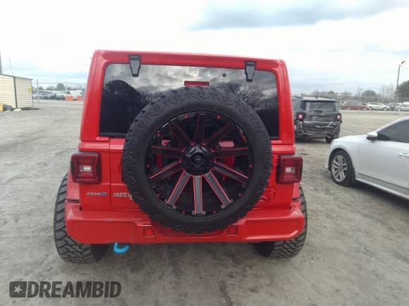 2022 Jeep Wrangler Unlimited Sahara with VIN 1C4JJXP62NW136932, listed as a IAAI auction lot 41486025 with 36,986 mi miles and . Bid and sale history available at DreamBid. Image 17.
