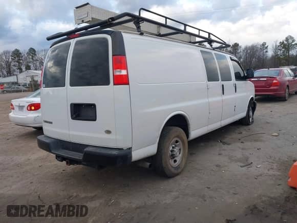 2017 Chevrolet Express Cargo with VIN 1GCWGBFG4H1348685, listed as a IAAI auction lot 41234959 with 215,067 mi miles and . Bid and sale history available at DreamBid. Image 4.