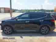 2017 Hyundai Santa Fe Ultimate z VIN 5XYZWDLAXHG468308, wystawiony jako IAAI lot #42660810 z przebiegiem 137 165 mil mil oraz . Historia ofert i sprzedaży dostępna na DreamBid. Obrazek 14.