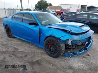 2023 Dodge Charger Scat Pack with VIN 2C3CDXGJ0PH603209, listed as a IAAI auction lot 43122682 with 28,629 mi miles and . Bid and sale history available at DreamBid. Image 1.
