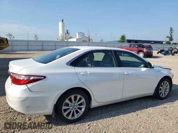2015 Toyota Camry LE с VIN 4T1BD1FK0FU176006, выставлен на аукционе Copart как лот 69081275 с пробегом 131 855 миль миль и Списание • Salvage title. История ставок и продаж доступна на DreamBid. Изображение 3.