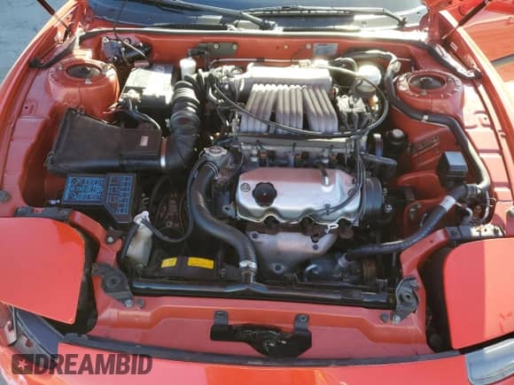 1991 Dodge Stealth with VIN JB3XD44SXMY018827, listed as a Copart auction lot 79144264 with 104,140 mi miles and Salvage title. Bid and sale history available at DreamBid. Image 12.