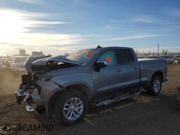 2023 Chevrolet Silverado 1500 LT with VIN 1GCRDDED6PZ209828, listed as a Copart auction lot 82748454 with Not provided miles and Salvage title. Bid and sale history available at DreamBid. Image 1.