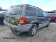 1999 Jeep Grand Cherokee Laredo z VIN 1J4GW58NXXC736618, wystawiony jako IAAI lot #43042986 z przebiegiem Nie podano mil oraz . Historia ofert i sprzedaży dostępna na DreamBid. Obrazek 4.