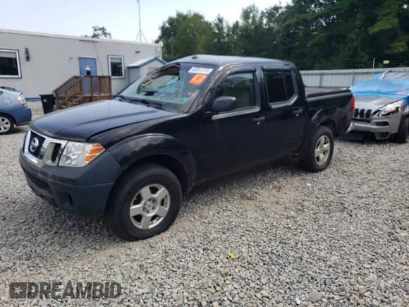 2014 Nissan Frontier SV with VIN 1N6AD0EV8EN708579, listed as a Copart auction lot 68041215 with 203,056 mi miles and Salvage title. Bid and sale history available at DreamBid. Image 1.