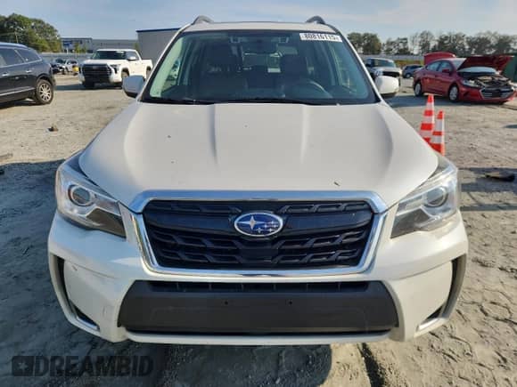 2017 Subaru Forester Touring z VIN JF2SJGWCXHH542608, wystawiony jako Copart lot #80816115 z przebiegiem 147 233 mil mil oraz Szkoda całkowita • Salvage title. Historia ofert i sprzedaży dostępna na DreamBid. Obrazek 5.