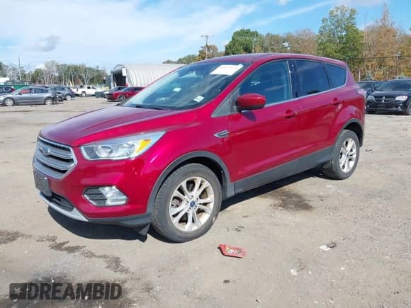 2017 Ford Escape SE with VIN 1FMCU9G9XHUB55584, listed as a IAAI auction lot 43377373 with 106,045 mi miles and . Bid and sale history available at DreamBid. Image 2.
