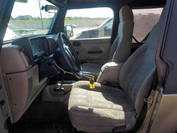 2004 Jeep Wrangler Sport z VIN 1J4FA49S24P710365, wystawiony jako Copart lot #68557195 z przebiegiem 242 901 mil mil oraz Szkoda całkowita • Salvage title. Historia ofert i sprzedaży dostępna na DreamBid. Obrazek 7.