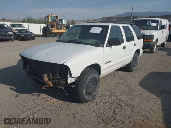 2004 Chevrolet Blazer LS with VIN 1GNDT13X24K152628, listed as a IAAI auction lot 42976588 with 141,655 mi miles and . Bid and sale history available at DreamBid. Image 2.