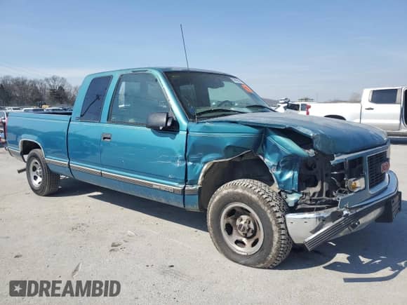 1997 GMC Sierra 1500 z VIN 1GTEC19R9VE510927, wystawiony jako Copart lot #50908545 z przebiegiem 213 770 mil mil oraz Czysty tytuł • Clean title. Historia ofert i sprzedaży dostępna na DreamBid. Obrazek 4.