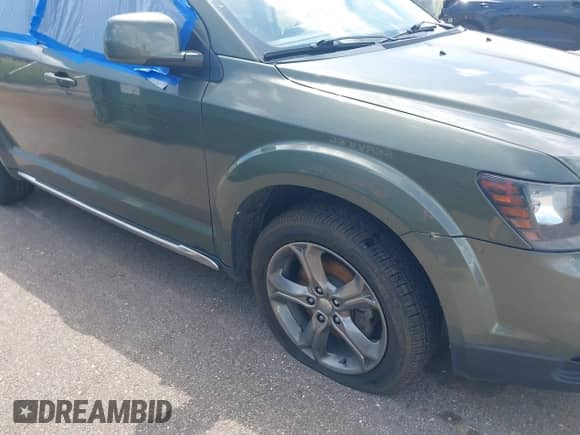 2017 Dodge Journey Crossroad Plus with VIN 3C4PDDGG8HT696084, listed as a IAAI auction lot 42822588 with 73,368 mi miles and . Bid and sale history available at DreamBid. Image 6.