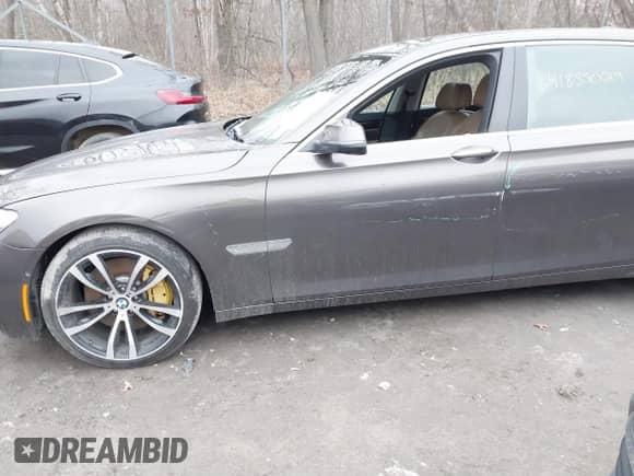 2014 BMW 7 Series ALPINA B7 xDrive with VIN WBAYF8C56ED653288, listed as a IAAI auction lot 41859029 with 145,355 mi miles and . Bid and sale history available at DreamBid. Image 6.