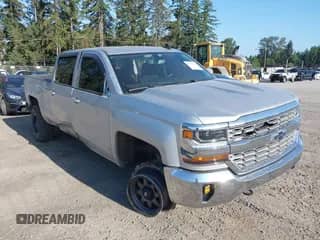 2017 Chevrolet Silverado 1500 LT z VIN 1GCUKREC5HF152660, wystawiony jako IAAI lot #42753266 z przebiegiem 100 966 mil mil oraz . Historia ofert i sprzedaży dostępna na DreamBid. Obrazek 1.