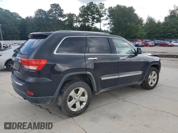 2012 Jeep Grand Cherokee Limited z VIN 1C4RJEBG9CC171585, wystawiony jako Copart lot #64460625 z przebiegiem 165 904 mil mil oraz Szkoda całkowita • Salvage title. Historia ofert i sprzedaży dostępna na DreamBid. Obrazek 3.