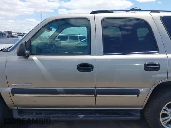 2003 Chevrolet Tahoe Z71 with VIN 1GNEK13ZX3R272515, listed as a IAAI auction lot 42073099 with 150,877 mi miles and . Bid and sale history available at DreamBid. Image 14.