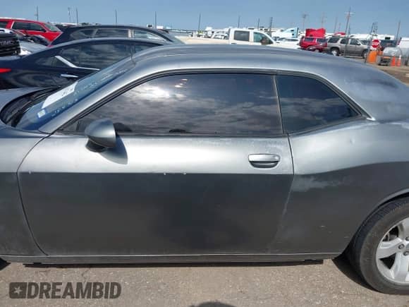 2012 Dodge Challenger SXT Plus with VIN 2C3CDYAG3CH254513, listed as a IAAI auction lot 42637442 with 104,659 mi miles and . Bid and sale history available at DreamBid. Image 14.