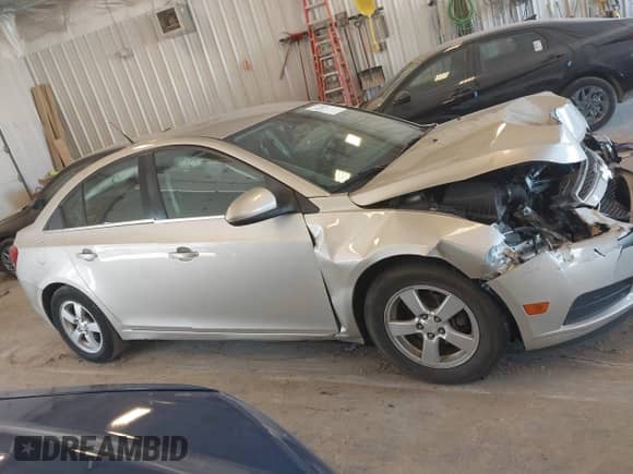 2014 Chevrolet Cruze 1LT с VIN 1G1PC5SB1E7448529, выставлен на аукционе IAAI как лот 43244316 с пробегом 86 868 миль миль и . История ставок и продаж доступна на DreamBid. Изображение 13.