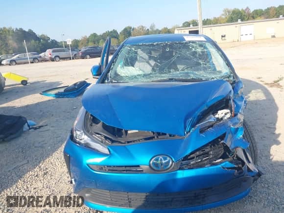 2021 Toyota Prius L Eco with VIN JTDKAMFU1M3136133, listed as a IAAI auction lot 43285926 with 49,911 mi miles and . Bid and sale history available at DreamBid. Image 11.