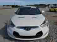 2012 Hyundai Veloster w/Gray Int z VIN KMHTC6AD0CU056764, wystawiony jako Copart lot #84646725 z przebiegiem 157 456 mil mil oraz Czysty tytuł • Clean title. Historia ofert i sprzedaży dostępna na DreamBid. Obrazek 5.