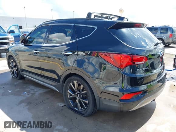2017 Hyundai Santa Fe Ultimate z VIN 5NMZWDLA1HH039533, wystawiony jako IAAI lot #42591353 z przebiegiem 80 375 mil mil oraz . Historia ofert i sprzedaży dostępna na DreamBid. Obrazek 3.