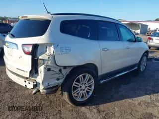 2014 Chevrolet Traverse LT with VIN 1GNKRGKDXEJ351403, listed as a IAAI auction lot 43478003 with 128,967 mi miles and . Bid and sale history available at DreamBid. Image 4.