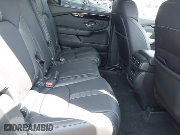 2024 Honda Pilot Touring with VIN 5FNYG1H77RB024994, listed as a IAAI auction lot 42672752 with 23,740 mi miles and . Bid and sale history available at DreamBid. Image 8.