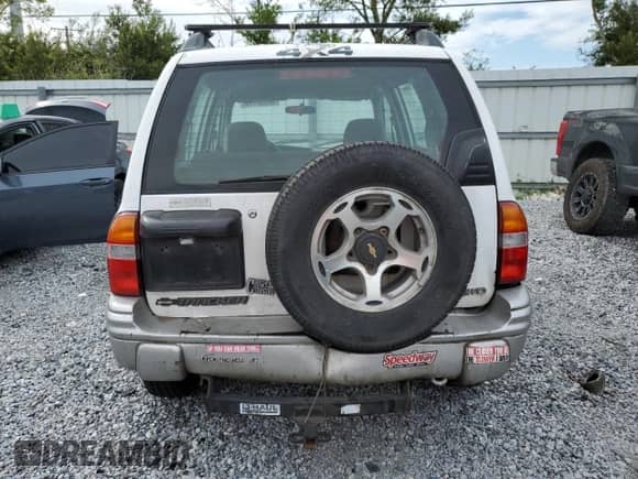 2001 Chevrolet Tracker LT with VIN 2CNBJ634816913553, listed as a Copart auction lot 80538115 with 179,159 mi miles and Salvage title. Bid and sale history available at DreamBid. Image 6.