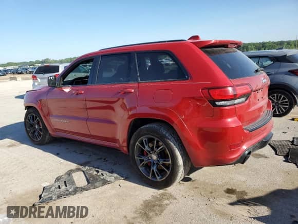2014 Jeep Grand Cherokee SRT-8 z VIN 1C4RJFDJ6EC331312, wystawiony jako Copart lot #59111145 z przebiegiem 112 803 mil mil oraz Szkoda całkowita • Salvage title. Historia ofert i sprzedaży dostępna na DreamBid. Obrazek 2.