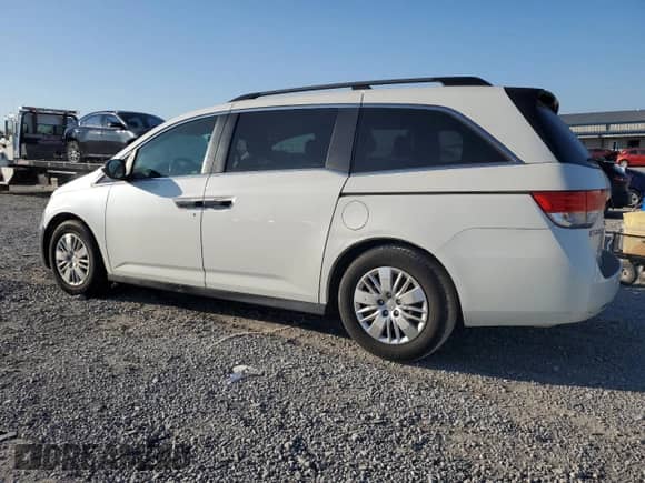 2014 Honda Odyssey LX with VIN 5FNRL5H29EB094020, listed as a Copart auction lot 85722415 with 217,186 mi miles and Clean title. Bid and sale history available at DreamBid. Image 2.