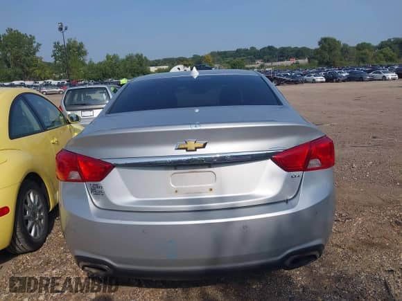 2014 Chevrolet Impala LTZ with VIN 2G1155S39E9308154, listed as a IAAI auction lot 43153318 with 176,757 mi miles and . Bid and sale history available at DreamBid. Image 16.