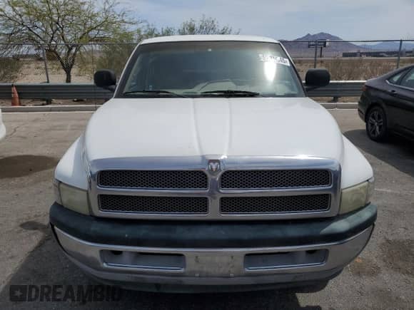 1999 Dodge 1500 with VIN 3B7HC13Z4XG127818, listed as a Copart auction lot 52090945 with 245,977 mi miles and Clean title. Bid and sale history available at DreamBid. Image 5.