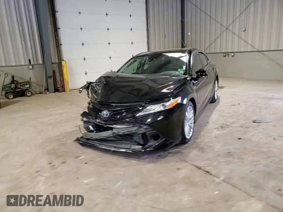 2019 Toyota Camry Hybrid LE z VIN 4T1B21HK7KU515521, wystawiony jako Copart lot #70407265 z przebiegiem 200 945 mil mil oraz Szkoda całkowita • Salvage title. Historia ofert i sprzedaży dostępna na DreamBid. Obrazek 14.