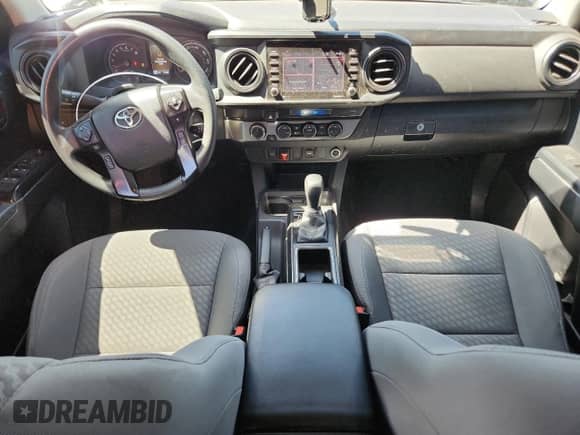 2021 Toyota Tacoma SR with VIN 3TMCZ5AN2MM406262, listed as a Copart auction lot 85597685 with 74,085 mi miles and Salvage title. Bid and sale history available at DreamBid. Image 8.