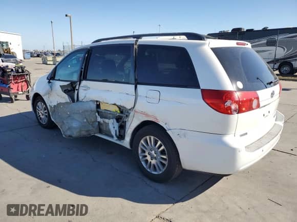 2010 Toyota Sienna XLE с VIN 5TDYK4CC3AS310667, выставлен на аукционе Copart как лот 86077205 с пробегом 184 017 миль миль и Списание • Salvage title. История ставок и продаж доступна на DreamBid. Изображение 2.