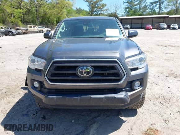 2021 Toyota Tacoma SR5 z VIN 5TFDZ5BN6MX059581, wystawiony jako IAAI lot #42051740 z przebiegiem 65 399 mil mil oraz . Historia ofert i sprzedaży dostępna na DreamBid. Obrazek 13.