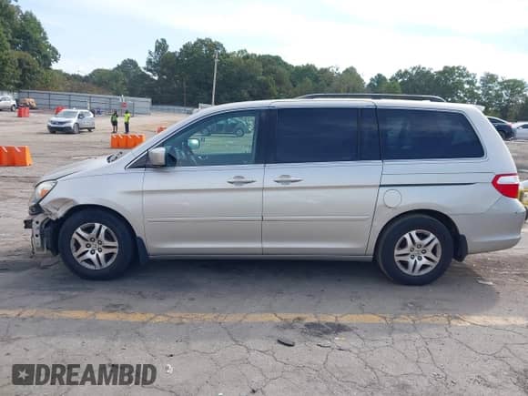 2007 Honda Odyssey Touring with VIN 5FNRL38807B043453, listed as a IAAI auction lot 43277263 with 175,132 mi miles and . Bid and sale history available at DreamBid. Image 14.