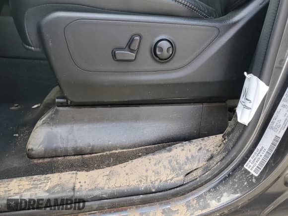 2023 Ram 1500 Rebel with VIN 1C6SRFLT8PN590542, listed as a Copart auction lot 70011115 with 27,609 mi miles and Salvage title. Bid and sale history available at DreamBid. Image 12.